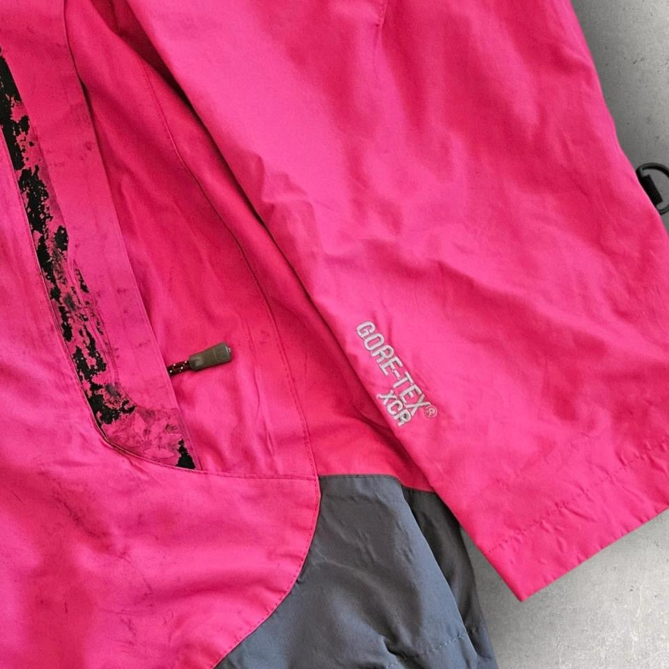 The North Face pink jacket size S boxy fit with marks all around