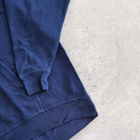 קפוצ’ון נייק כחול כהה, מידה L לגברים, גזרה בוקסית עם שרוול גומי צר, מצב חדש ללא פגמים