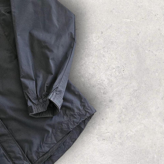 מעיל גשם Champion בעיצוב Y2K בצבע שחור במידה M