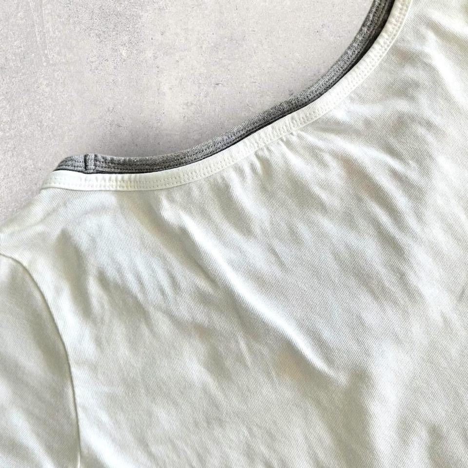 Vintage Champion Woman’s White T-shirt - S T-Shirts 65.00 NIS Vintage Champion Woman’s White T-shirt - S Lizard Vintage Clothes