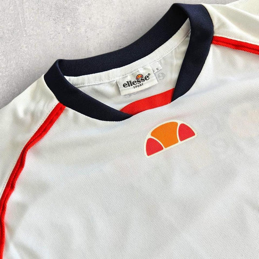 Vintage Ellesse White Dri Fit T-shirt - S T-Shirts Lizard Vintage Clothes 70.00 NIS Vintage Ellesse White Dri Fit T-shirt - S