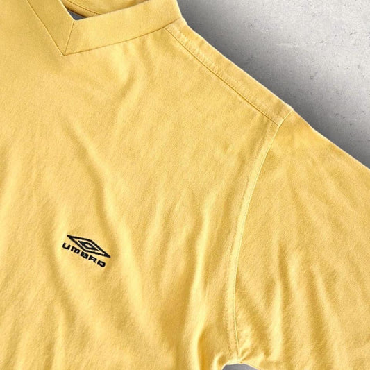 Umbro Vintage V-neck yellow T-shirt - M 55.00 NIS Umbro Vintage V-neck yellow T-shirt - M Lizard Vintage Clothes T-Shirts