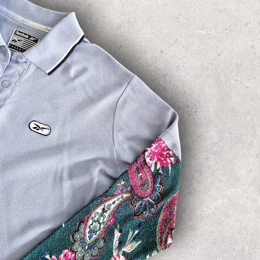 Vintage Reebok Reworked Polo Tee - S Vintage Reebok Reworked Polo Tee - S 75.00 NIS Lizard Vintage Clothes Polos