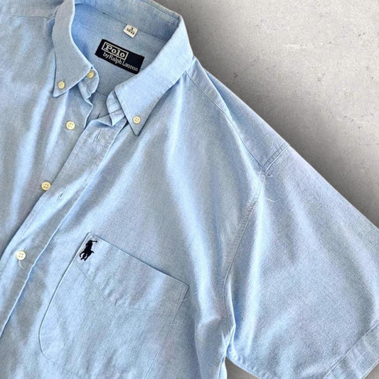 Polo Ralph Lauren Blue Short sleeve Polo - XL Polo Ralph Lauren Blue Short sleeve Polo - XL 90.00 NIS Lizard Vintage Clothes Polos