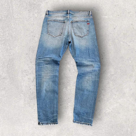Vintage Diesel blue jeans size 34 with front mark and heavy fade