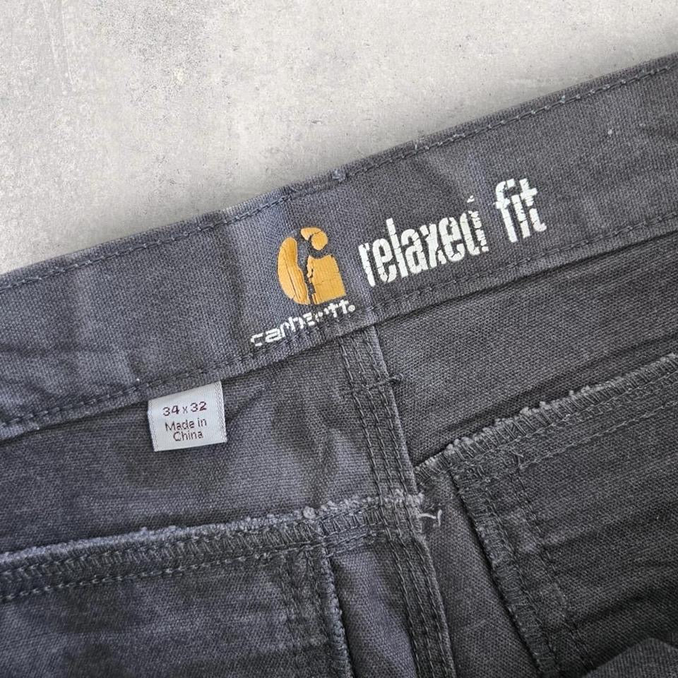 Carhartt grey workwear jeans 34x32 with straight fit and visible front marks