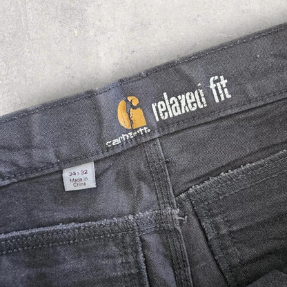 Carhartt grey workwear jeans 34x32 with straight fit and visible front marks