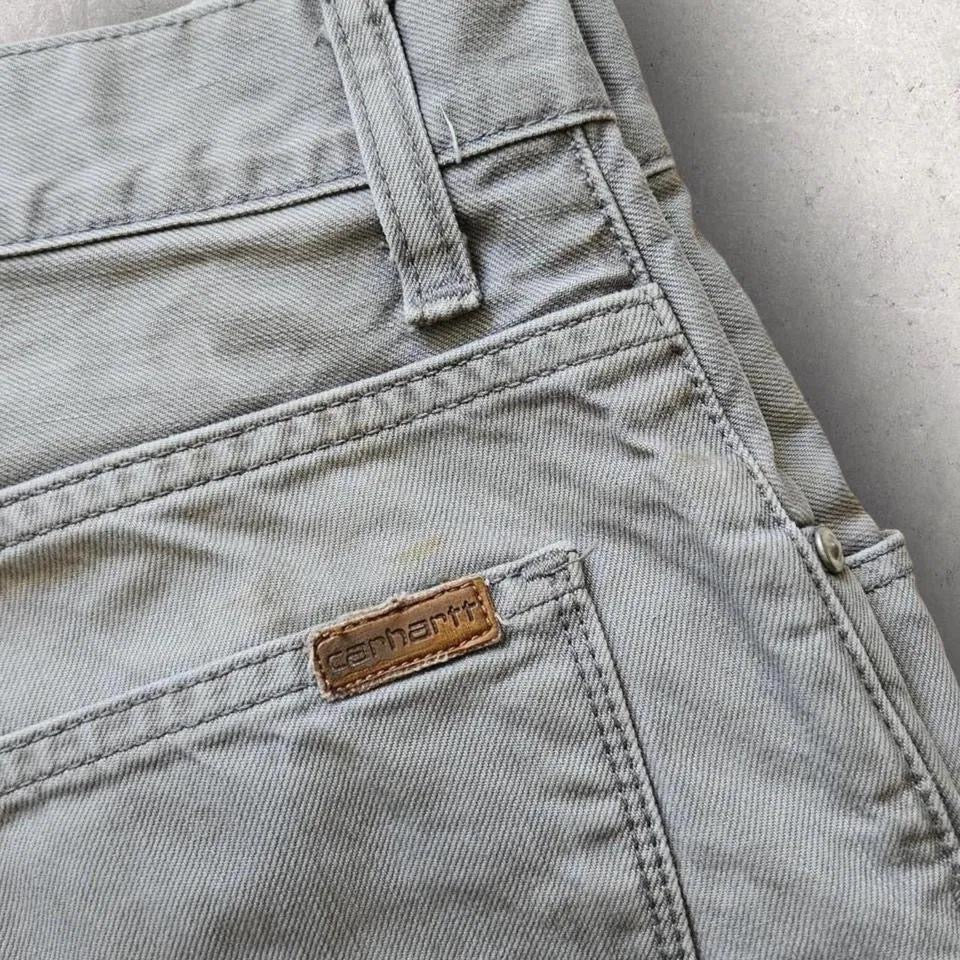 Vintage Carhartt jeans 31x32 with paint stains and worn front