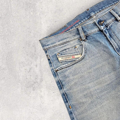 Vintage Diesel blue jeans size 34 with front mark and heavy fade