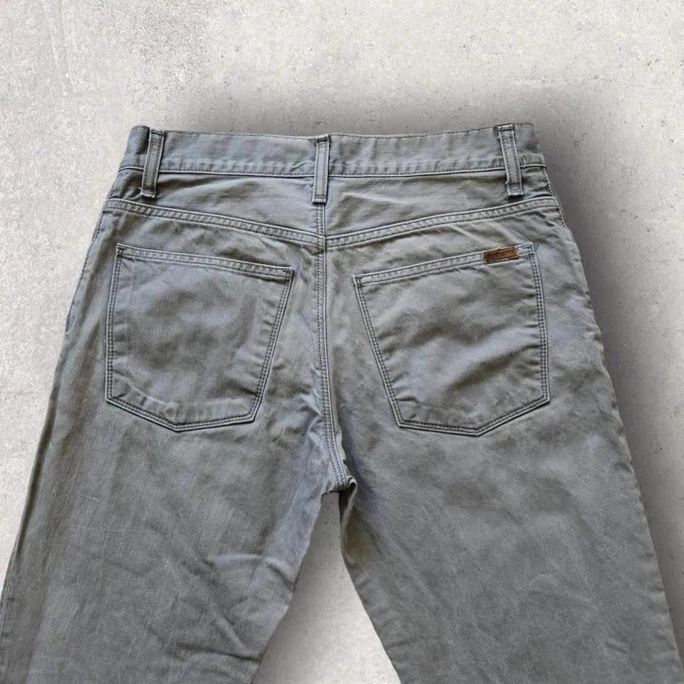 Vintage Carhartt jeans 31x32 with paint stains and worn front