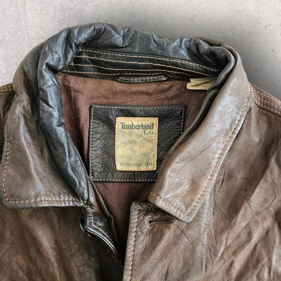 Vintage brown leather timberland jacket large with minor fade and missing button
