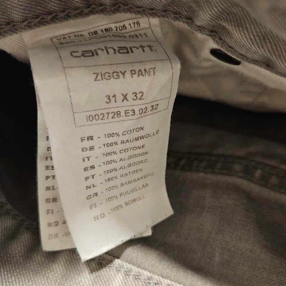 Vintage Carhartt jeans 31x32 with paint stains and worn front