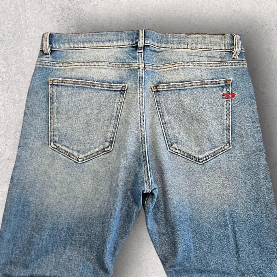 Vintage Diesel blue jeans size 34 with front mark and heavy fade