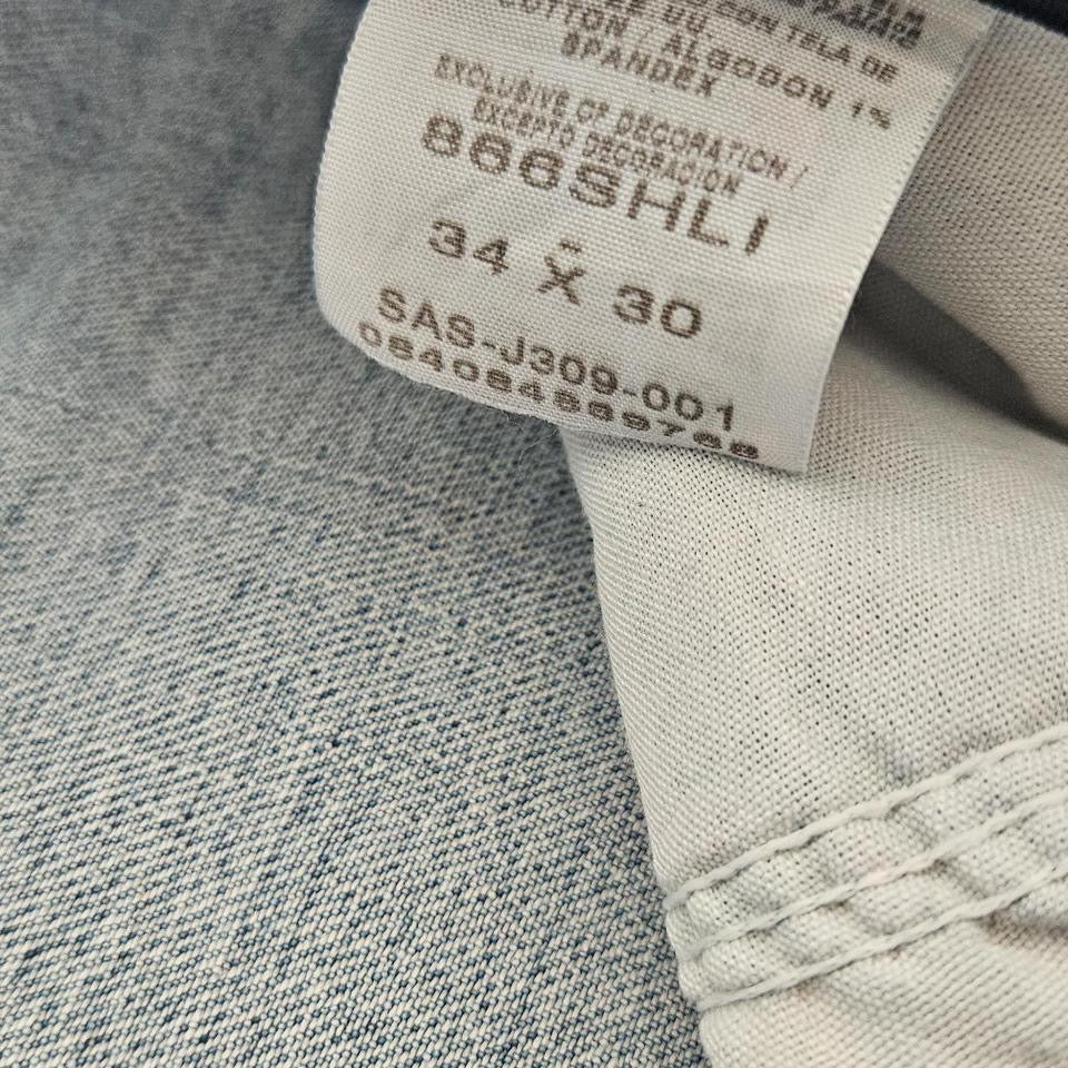 Wrangler blue short jeans size W34 with small stain on back