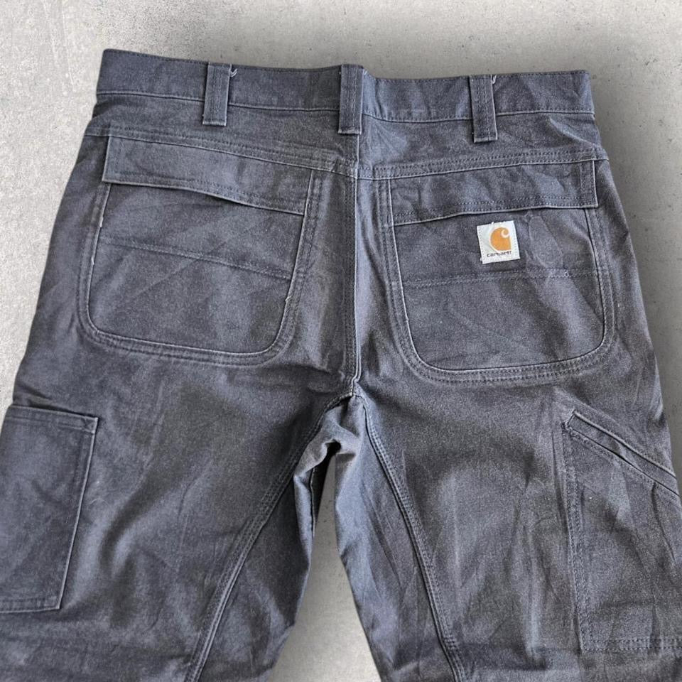 Carhartt grey workwear jeans 34x32 with straight fit and visible front marks