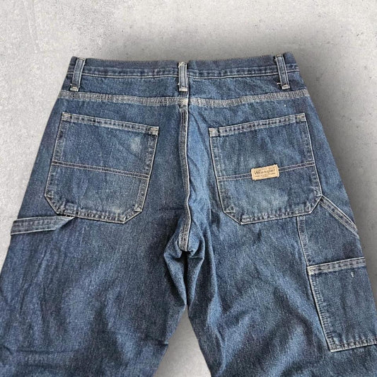 Wrangler Navy Thick Jeans – 30x32 עם חור ודעיכה קלה