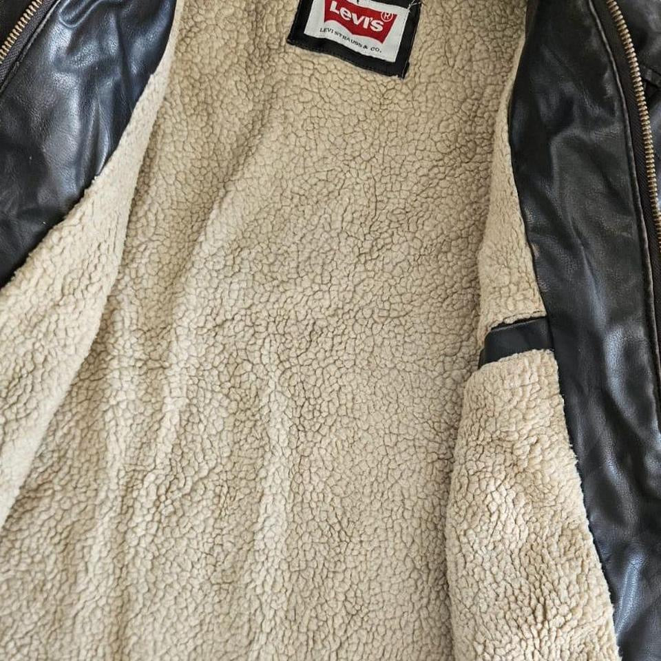 Levi’s vintage black leather jacket large with sheep skin lining in perfect condition