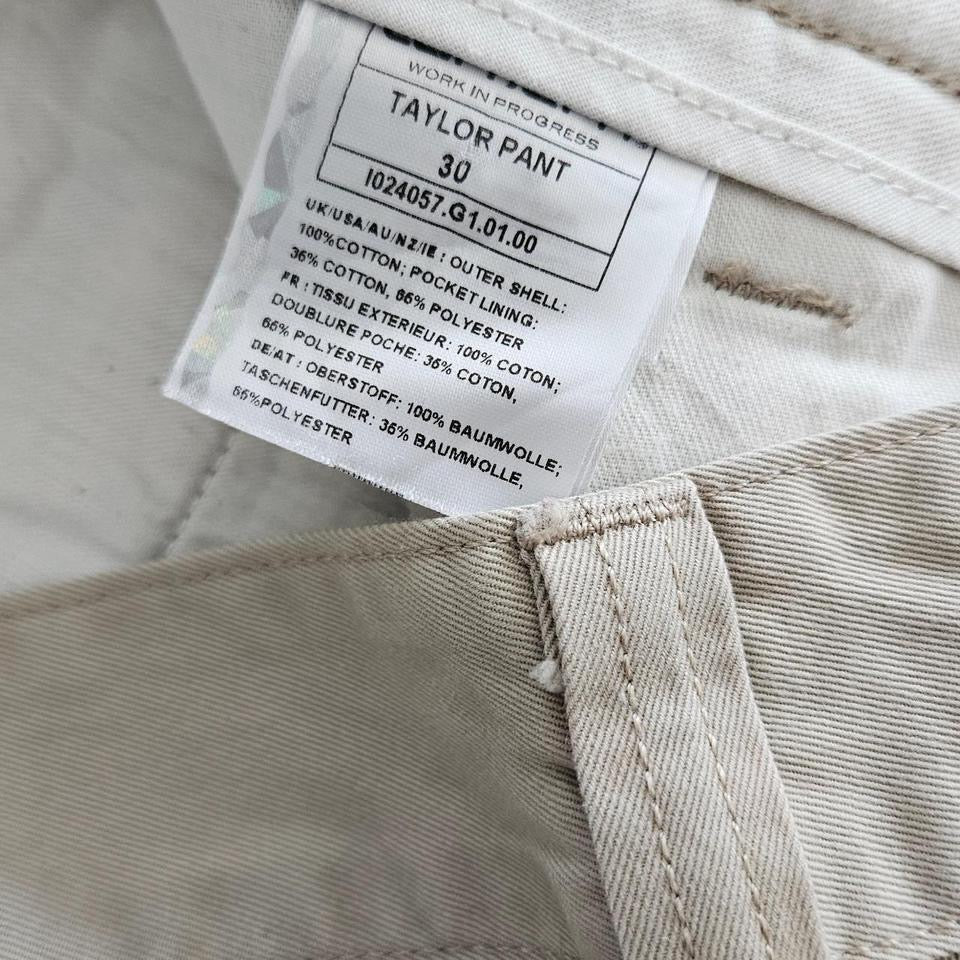 מכנסי Carhartt WIP בצבע קרם מידה W30