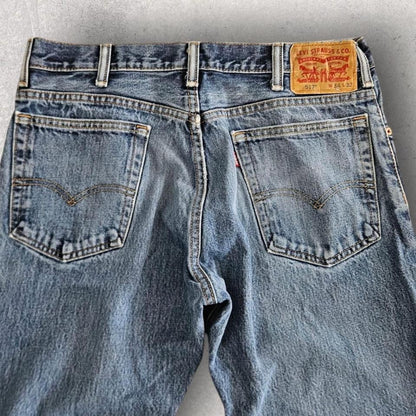 Levi’s 517 Navy Jeans – 34x32 vintage denim with marks and paint stain