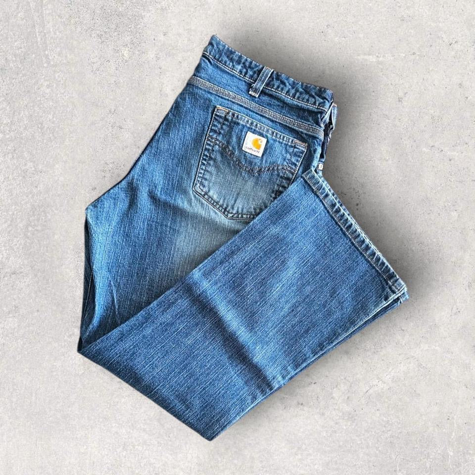 Carhartt Woman's Jeans לנשים – ג'ינס איכותי מקורי של קארהארט במצב מושלם. חלק מאוסף בגדי היד שנייה הגדול בישראל