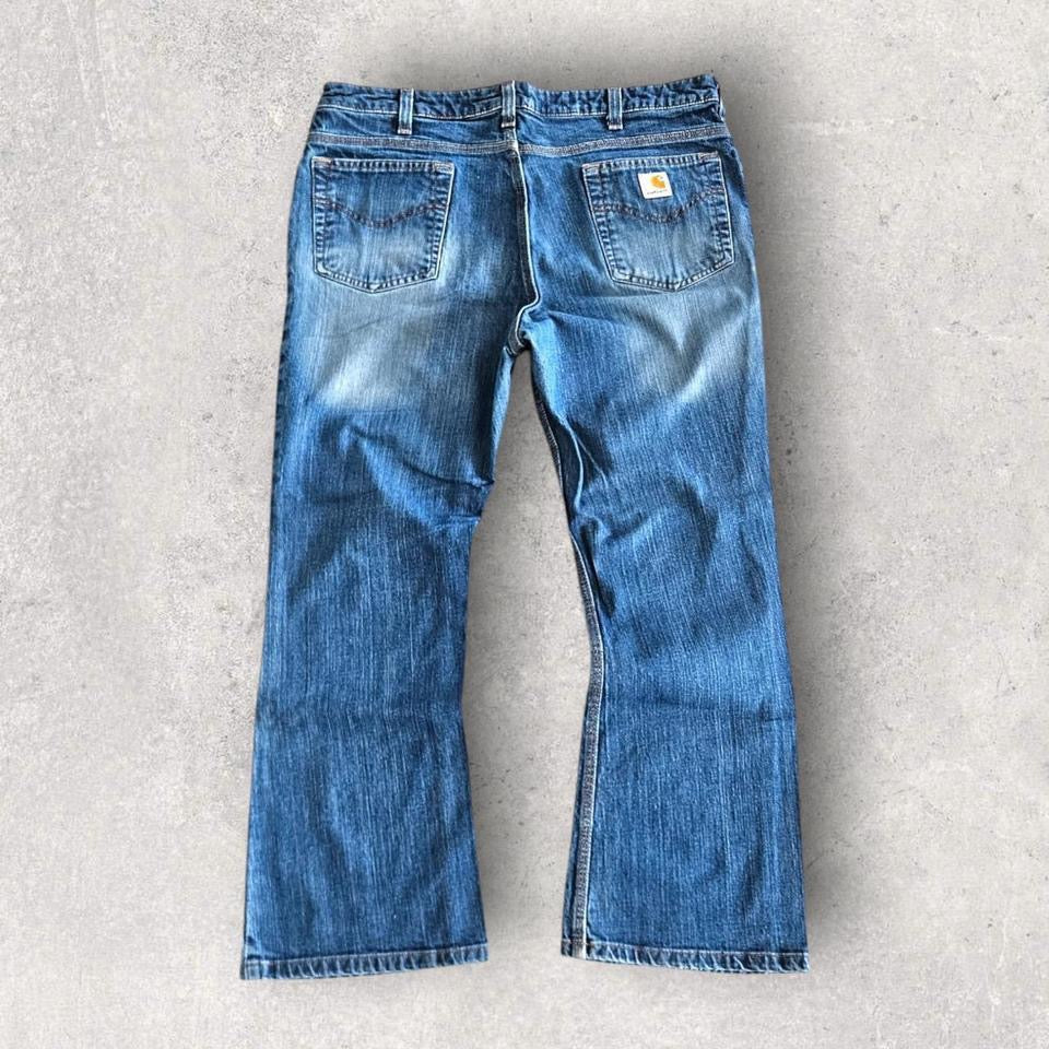 Carhartt Woman's Jeans לנשים – ג'ינס איכותי מקורי של קארהארט במצב מושלם. חלק מאוסף בגדי היד שנייה הגדול בישראל