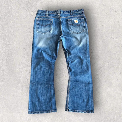 Carhartt Woman's Jeans לנשים – ג'ינס איכותי מקורי של קארהארט במצב מושלם. חלק מאוסף בגדי היד שנייה הגדול בישראל