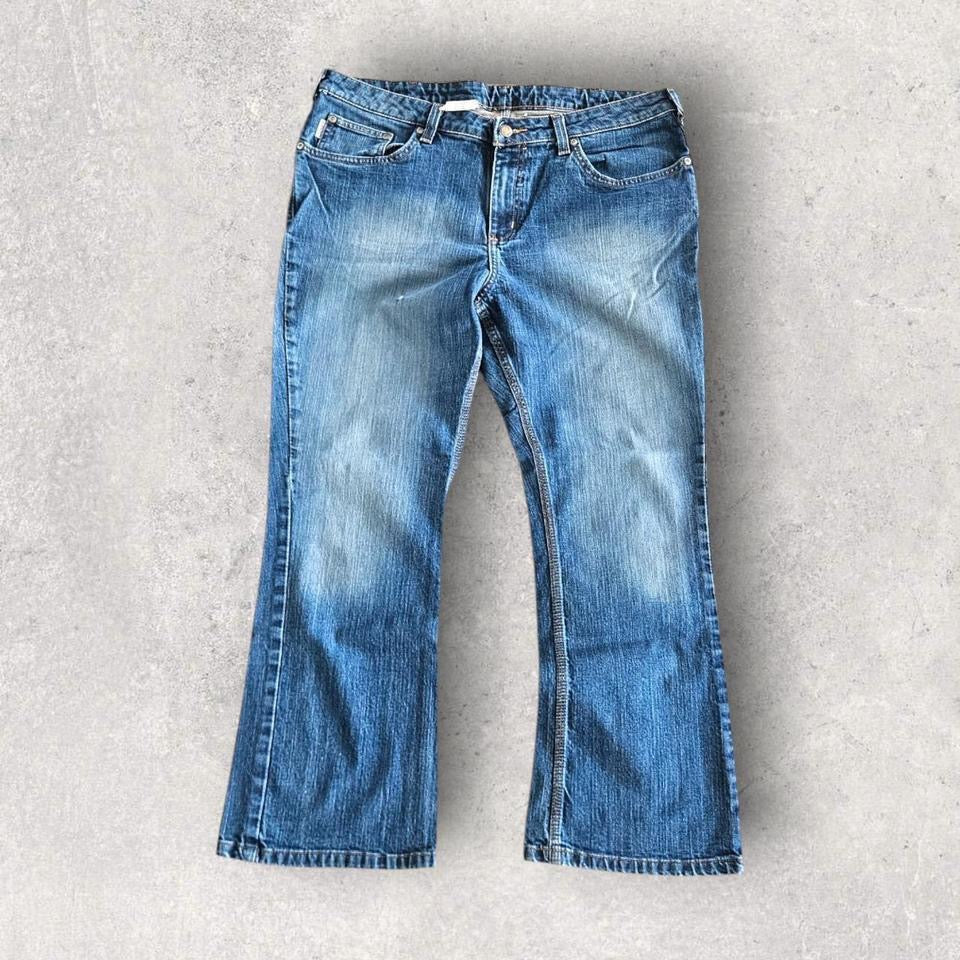 Carhartt Woman's Jeans לנשים – ג'ינס איכותי מקורי של קארהארט במצב מושלם. חלק מאוסף בגדי היד שנייה הגדול בישראל