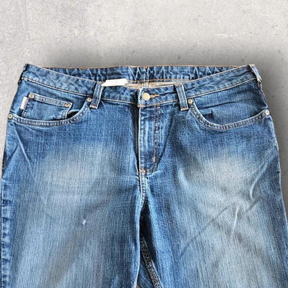 Carhartt Woman's Jeans לנשים – ג'ינס איכותי מקורי של קארהארט במצב מושלם. חלק מאוסף בגדי היד שנייה הגדול בישראל