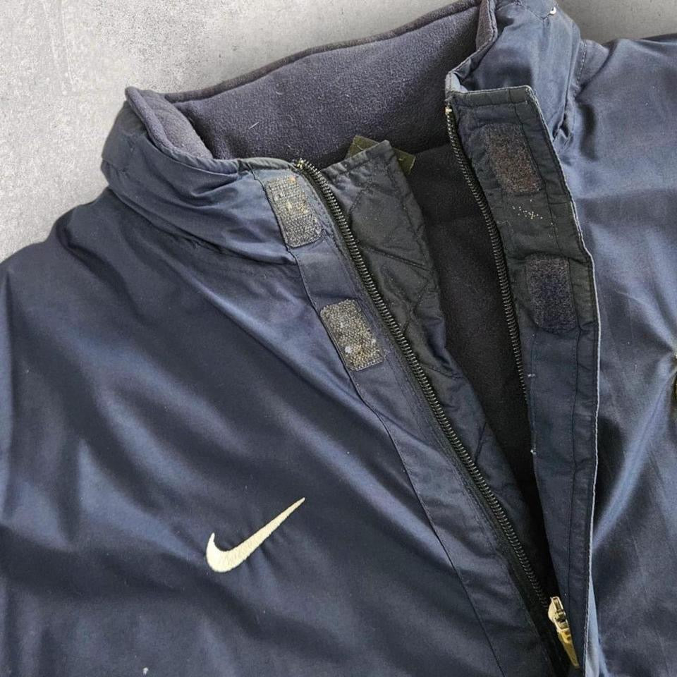 מעיל פuffer נייבי Y2K של Nike במידה XL ארוך