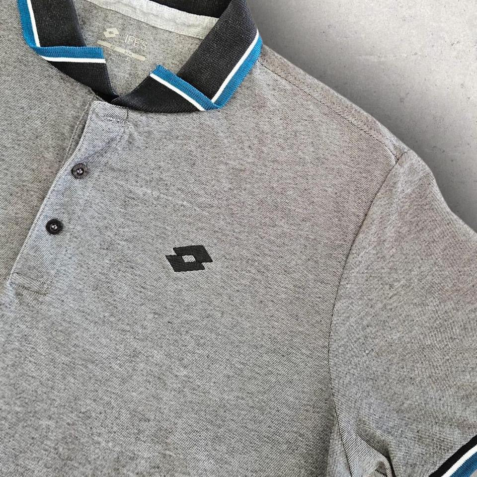 Grey Logo Polo Tee - XL Lizard Vintage Clothes Grey Logo Polo Tee - XL 65.00 NIS