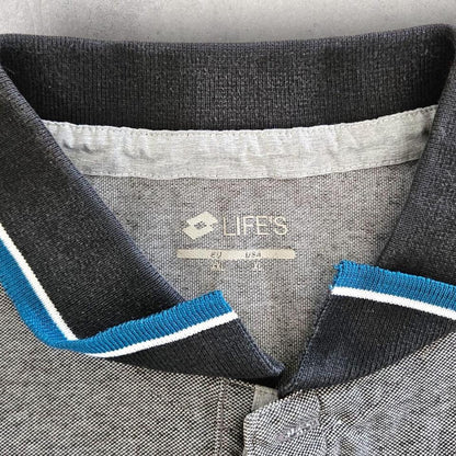 Grey Logo Polo Tee - XL Lizard Vintage Clothes Grey Logo Polo Tee - XL 65.00 NIS