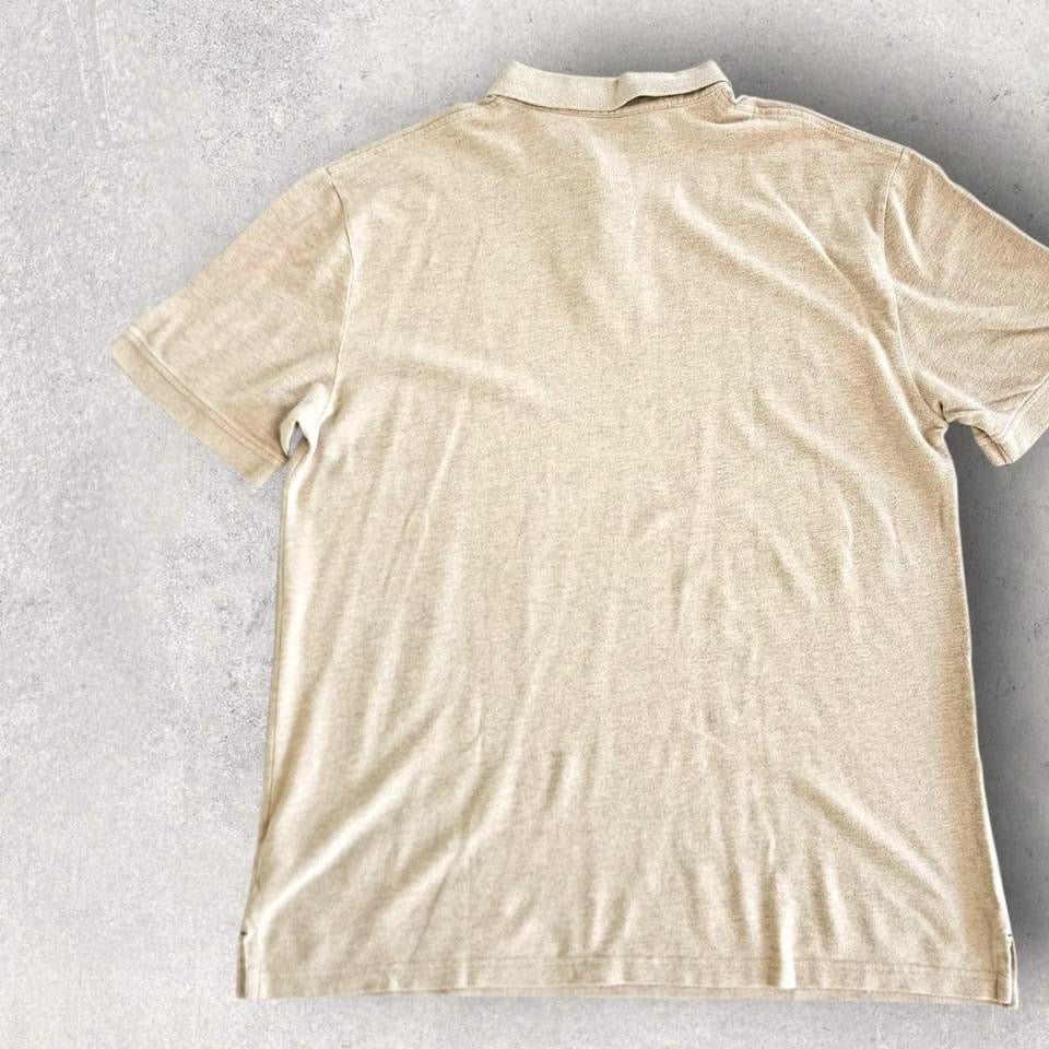 Tommy Hilfiger Cream Logo Poli Tee - XXL Tommy Hilfiger Cream Logo Poli Tee - XXL Lizard Vintage Clothes 85.00 NIS Polos