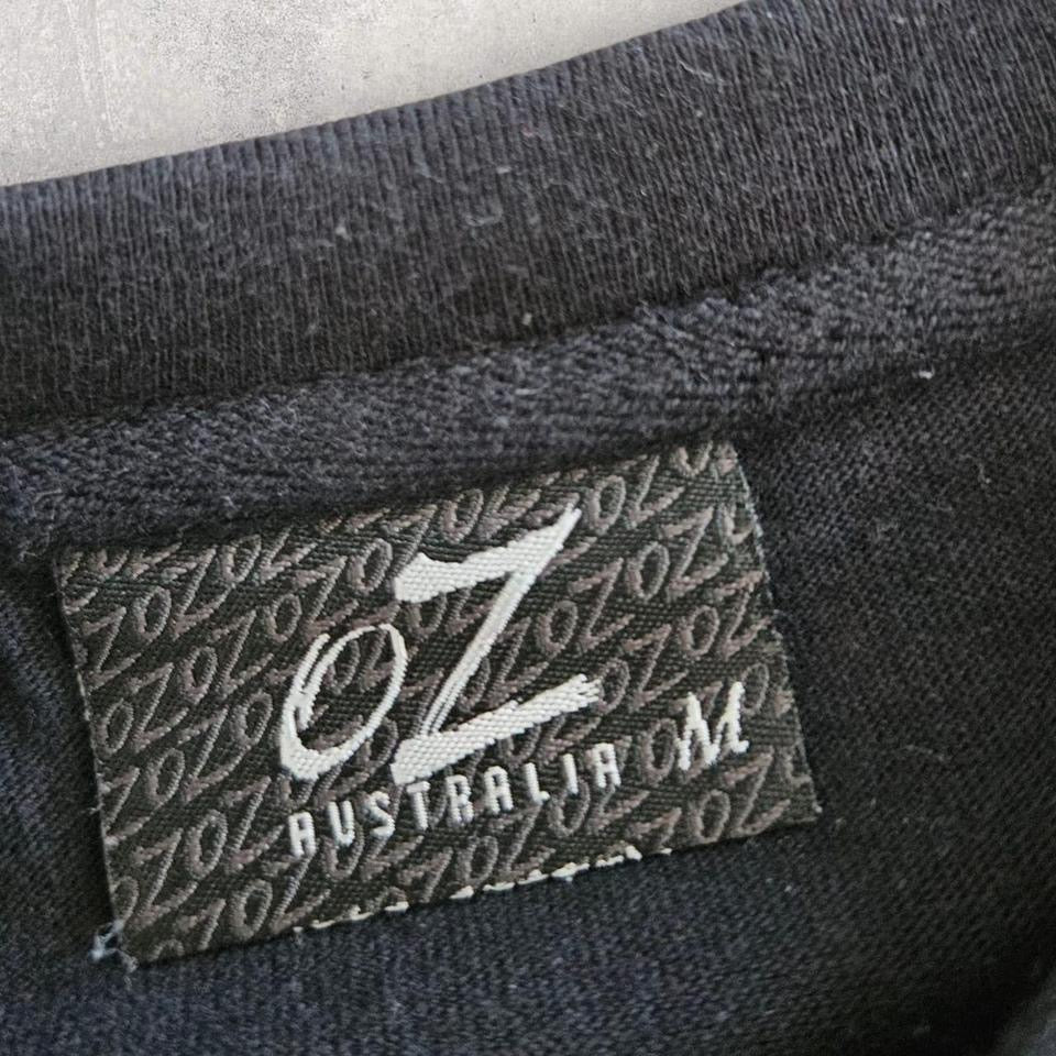 OZ Australia Black graphic T-shirt - M OZ Australia Black graphic T-shirt - M Lizard Vintage Clothes 80.00 NIS T-Shirts