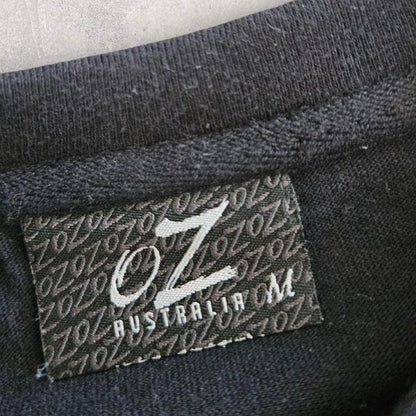OZ Australia Black graphic T-shirt - M OZ Australia Black graphic T-shirt - M Lizard Vintage Clothes 80.00 NIS T-Shirts