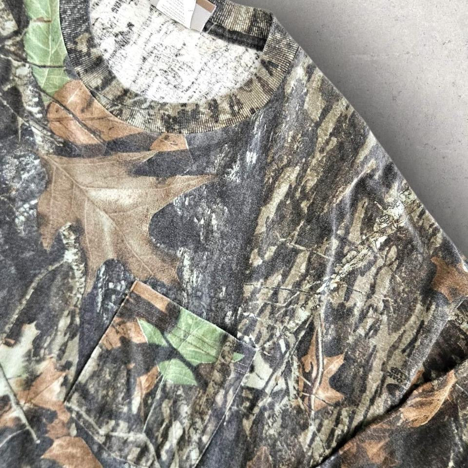 Vintage Jerzees Real Tree Camo Tee - XL Vintage Jerzees Real Tree Camo Tee - XL T-Shirts 135.00 NIS Lizard Vintage Clothes