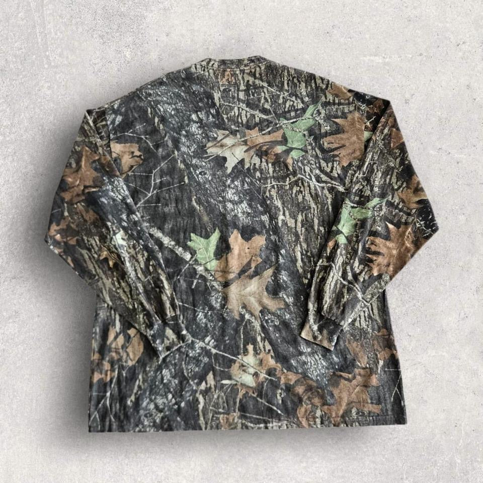 Vintage Jerzees Real Tree Camo Tee - XL Vintage Jerzees Real Tree Camo Tee - XL T-Shirts 135.00 NIS Lizard Vintage Clothes
