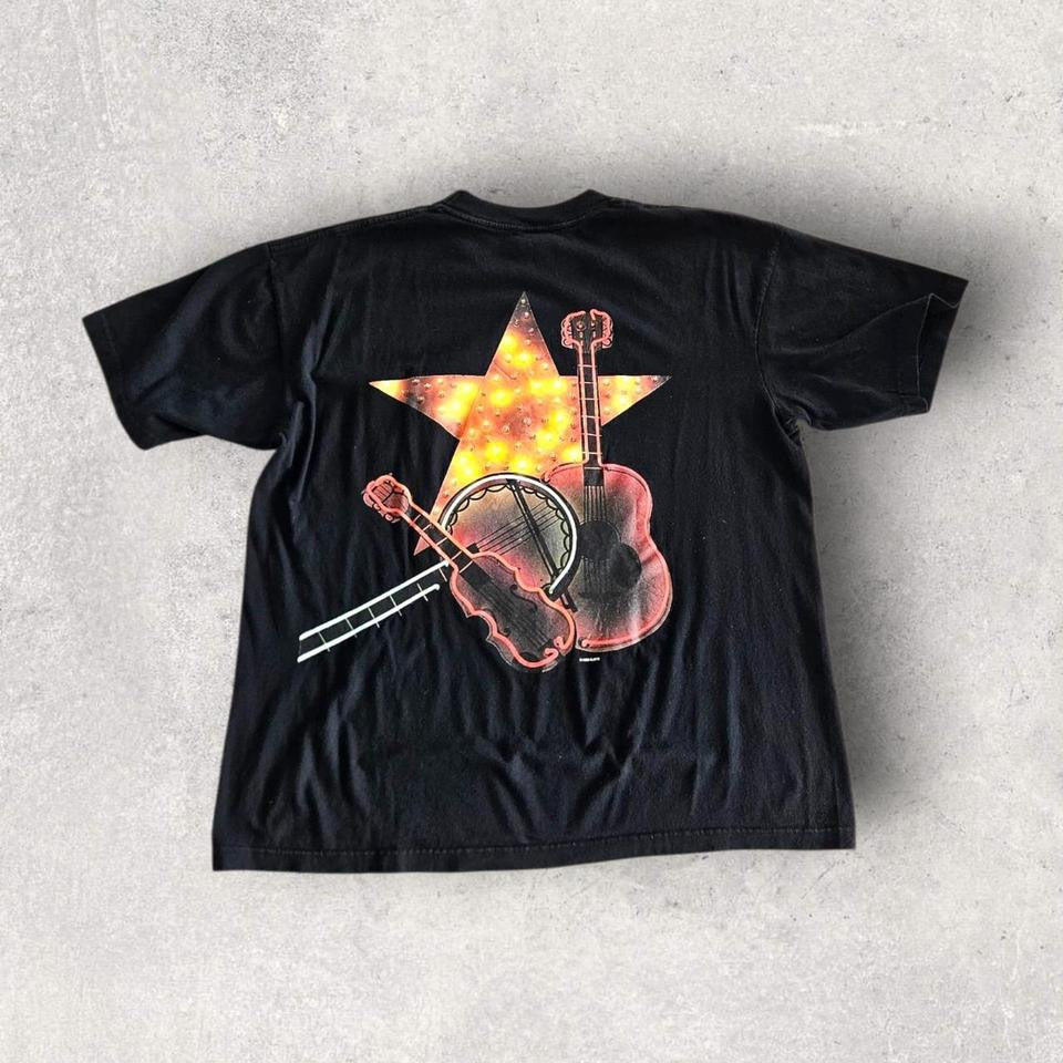 Vintage 1996 Black Pocket T-shirt - L T-Shirts 90.00 NIS Vintage 1996 Black Pocket T-shirt - L Lizard Vintage Clothes