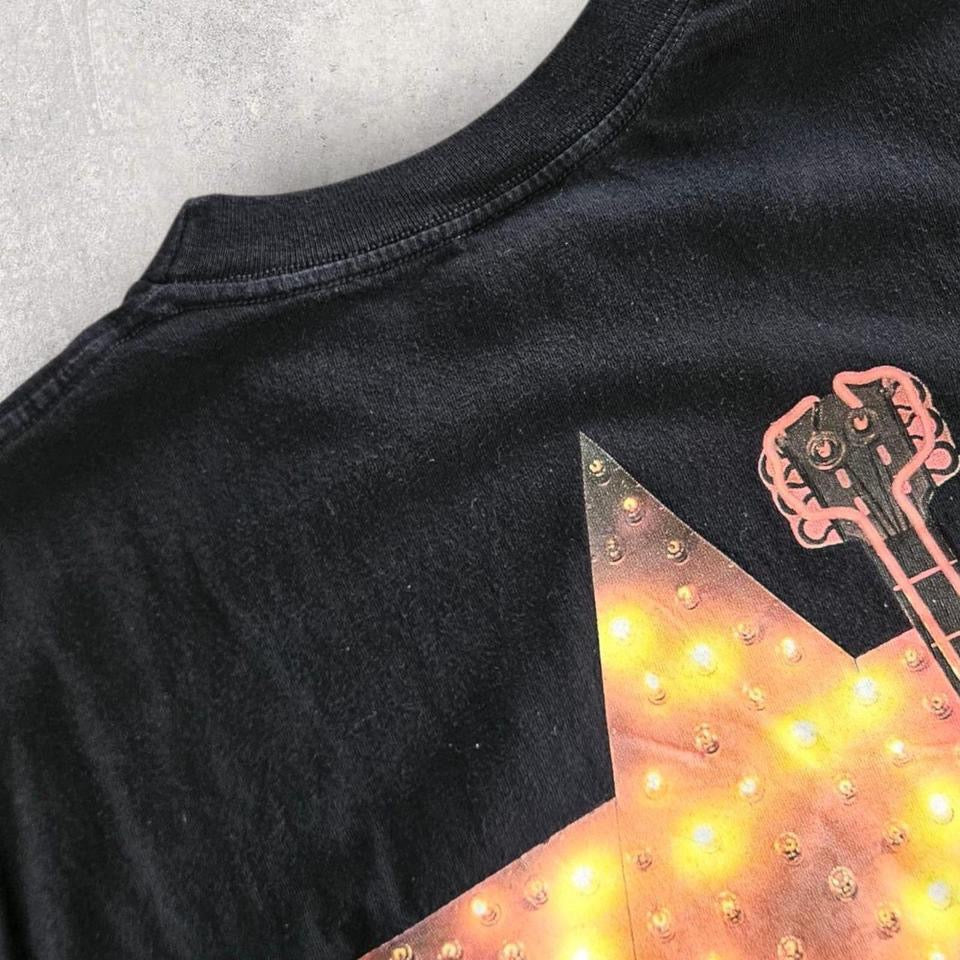 Vintage 1996 Black Pocket T-shirt - L T-Shirts 90.00 NIS Vintage 1996 Black Pocket T-shirt - L Lizard Vintage Clothes