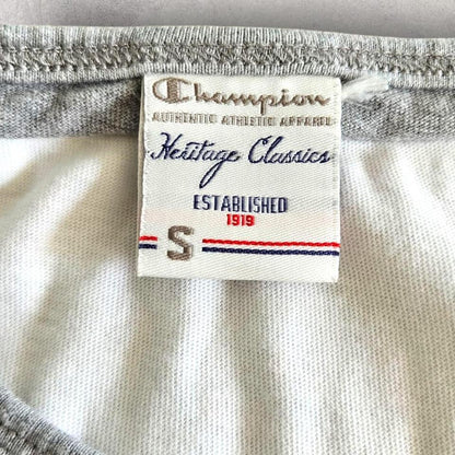 Vintage Champion Woman’s White T-shirt - S T-Shirts 65.00 NIS Vintage Champion Woman’s White T-shirt - S Lizard Vintage Clothes