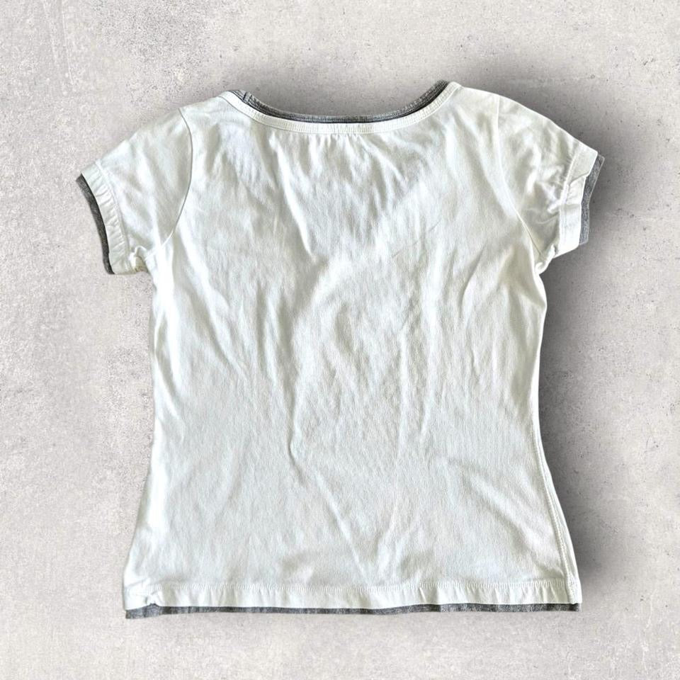 Vintage Champion Woman’s White T-shirt - S T-Shirts 65.00 NIS Vintage Champion Woman’s White T-shirt - S Lizard Vintage Clothes