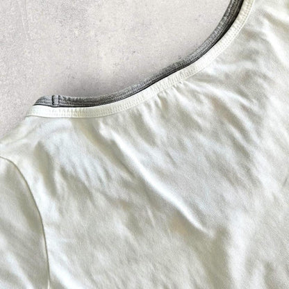 Vintage Champion Woman’s White T-shirt - S T-Shirts 65.00 NIS Vintage Champion Woman’s White T-shirt - S Lizard Vintage Clothes