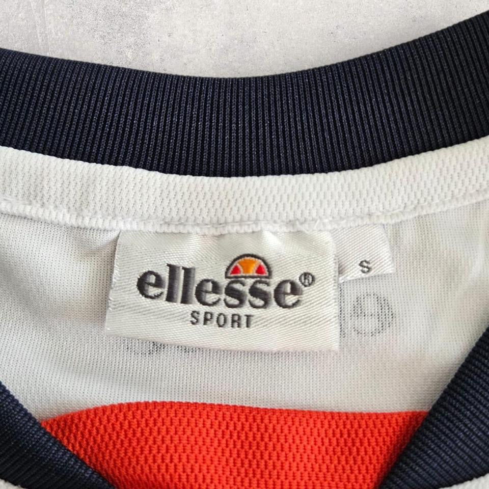 Vintage Ellesse White Dri Fit T-shirt - S T-Shirts Lizard Vintage Clothes 70.00 NIS Vintage Ellesse White Dri Fit T-shirt - S