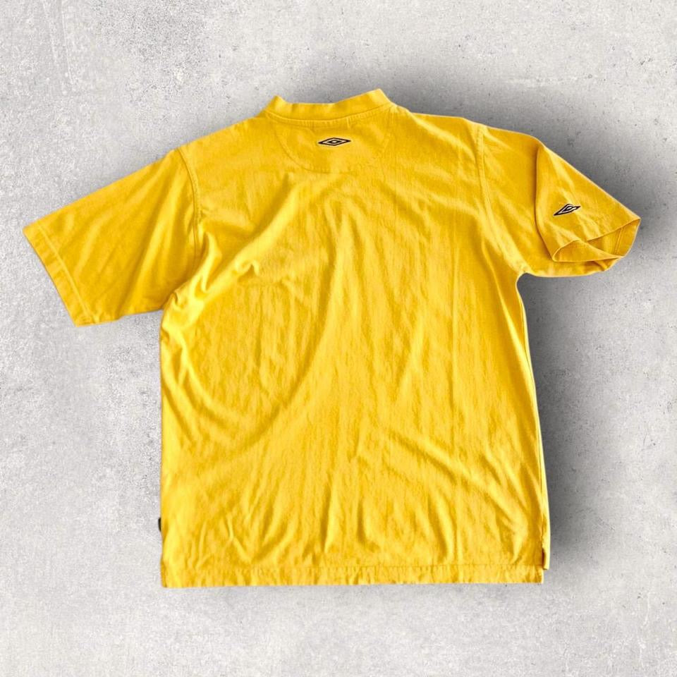 Umbro Vintage V-neck yellow T-shirt - M 55.00 NIS Umbro Vintage V-neck yellow T-shirt - M Lizard Vintage Clothes T-Shirts