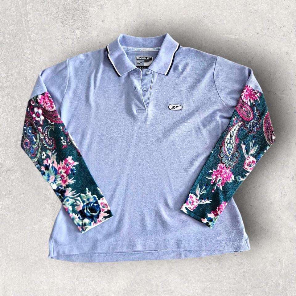 Vintage Reebok Reworked Polo Tee - S Vintage Reebok Reworked Polo Tee - S 75.00 NIS Lizard Vintage Clothes Polos