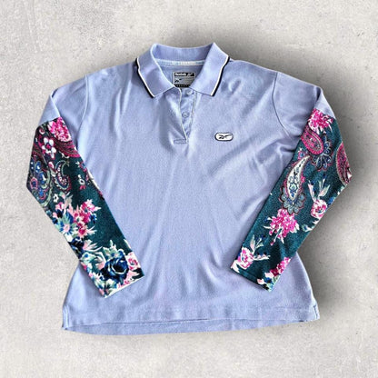 Vintage Reebok Reworked Polo Tee - S Vintage Reebok Reworked Polo Tee - S 75.00 NIS Lizard Vintage Clothes Polos