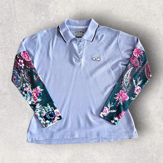Vintage Reebok Reworked Polo Tee - S Vintage Reebok Reworked Polo Tee - S 75.00 NIS Lizard Vintage Clothes Polos