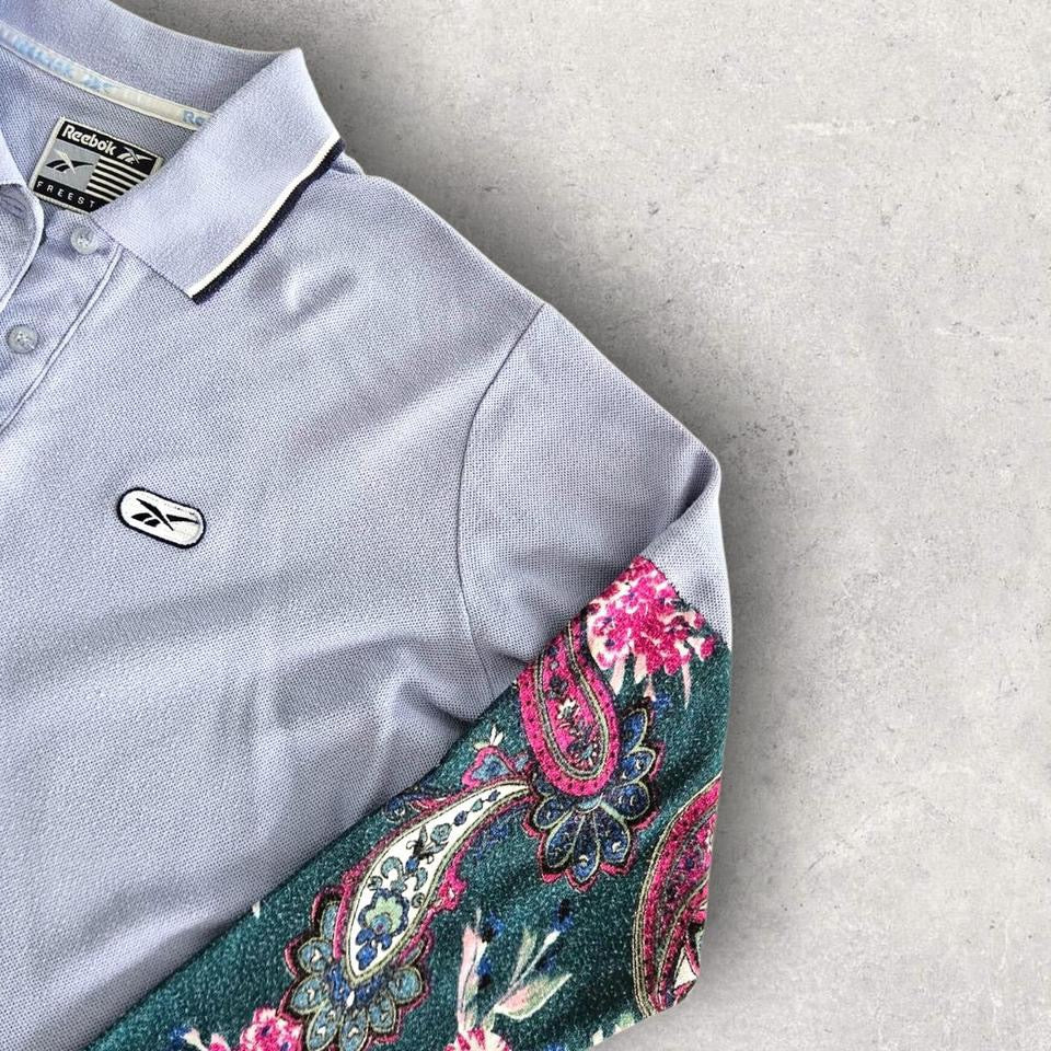 Vintage Reebok Reworked Polo Tee - S Vintage Reebok Reworked Polo Tee - S 75.00 NIS Lizard Vintage Clothes Polos