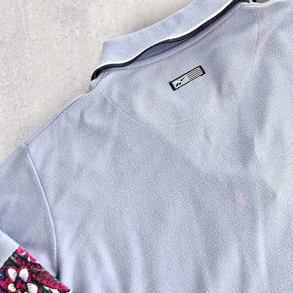 Vintage Reebok Reworked Polo Tee - S Vintage Reebok Reworked Polo Tee - S 75.00 NIS Lizard Vintage Clothes Polos