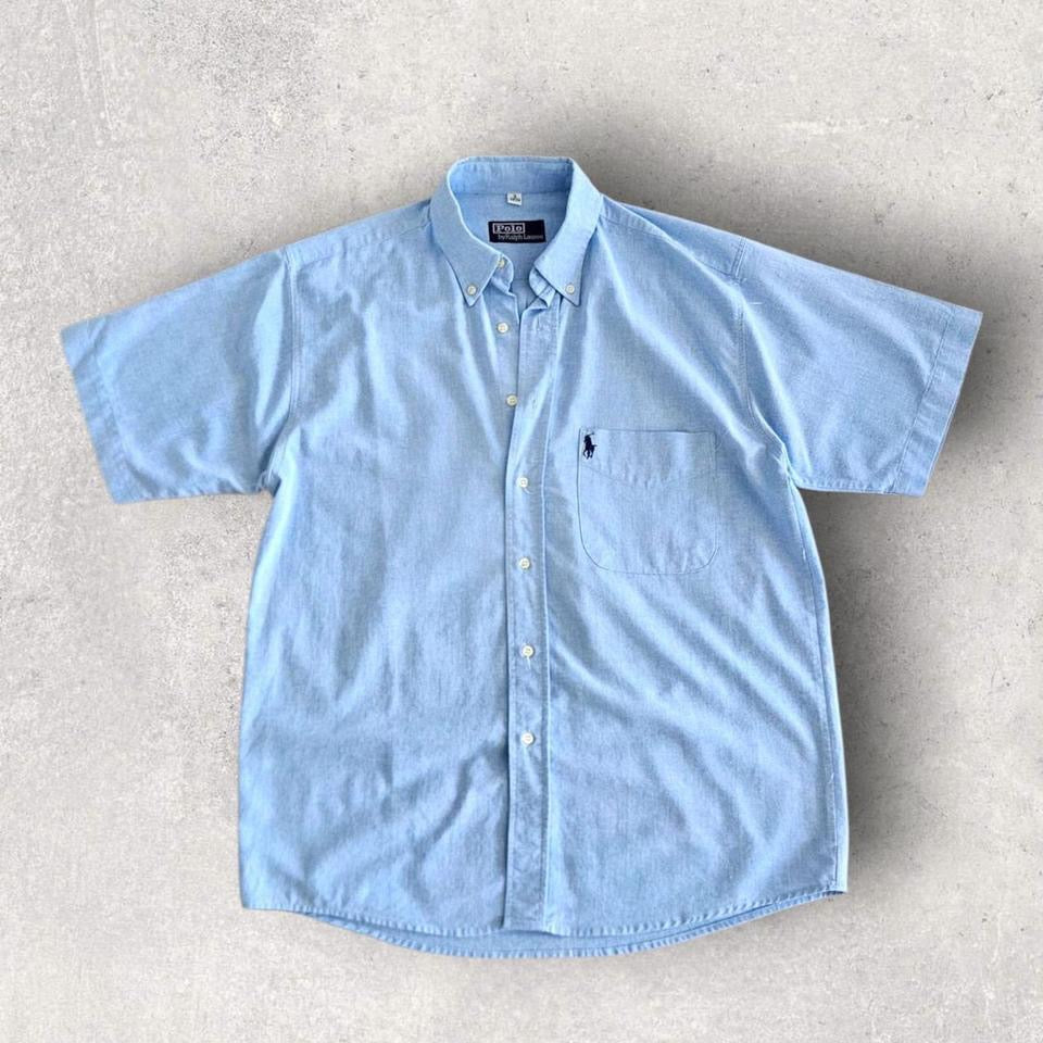 Polo Ralph Lauren Blue Short sleeve Polo - XL Polo Ralph Lauren Blue Short sleeve Polo - XL 90.00 NIS Lizard Vintage Clothes Polos