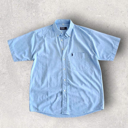 Polo Ralph Lauren Blue Short sleeve Polo - XL Polo Ralph Lauren Blue Short sleeve Polo - XL 90.00 NIS Lizard Vintage Clothes Polos